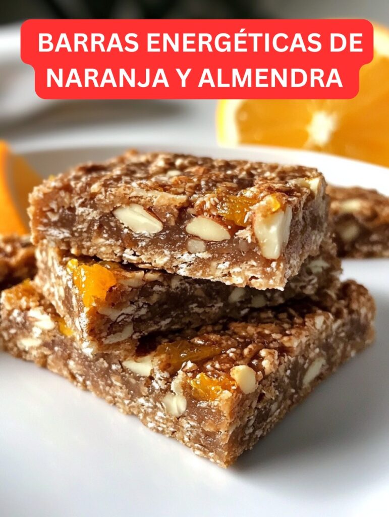 Barritas energéticas caseras de naranja y almendra sobre una tabla de madera.