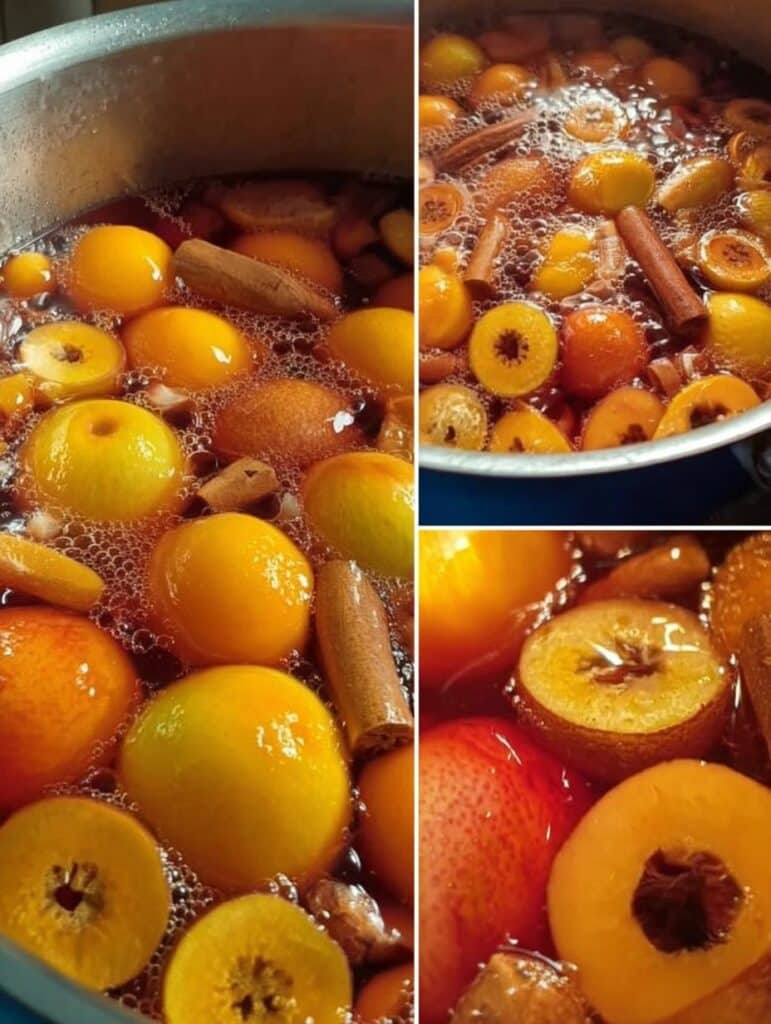 Ponche de frutas tradicional mexicano con canela, tejocote, manzana y guayaba servido en taza de barro.